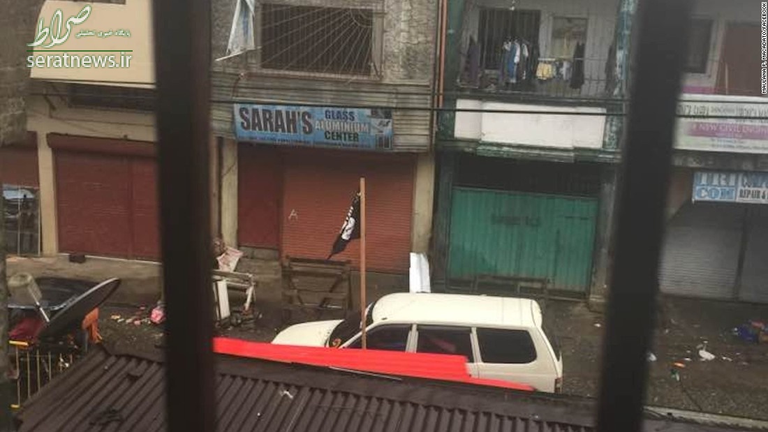 عکس/ اهتزاز پرچم داعش در ماراوی فیلیپین